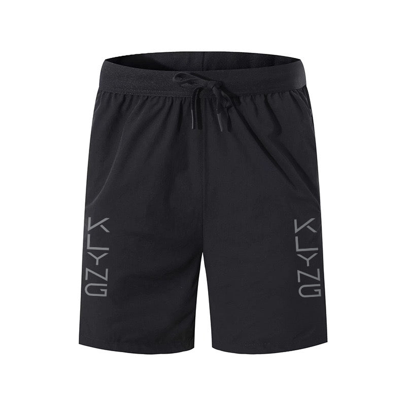 Black athletic shorts with an adjustable drawstring waistband. The word KLYNG is printed vertically on each leg.