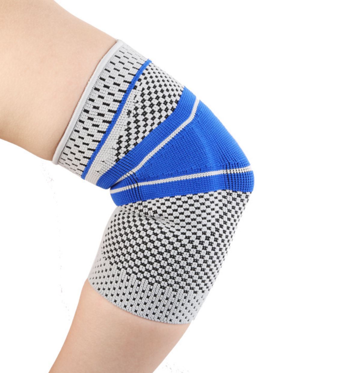 A close-up of a person wearing a blue and gray compression knee sleeve with a knitted pattern, providing support to the knee area.