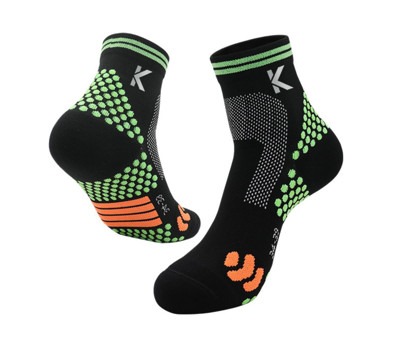 Introducing the Achilles Support High Performance Compression Socks by Klyng: These black athletic socks are adorned with green and orange textured patterns, specially designed for pickleball enthusiasts. They feature green stripes on the cuffs and a distinctive logo resembling the letter K near the top. Engineered with ankle support, these socks prioritize grip and performance to enhance your gameplay.