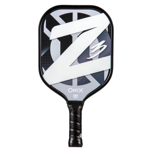 The Composite Z3 v2 Pickleball Paddle, approved by USAPA, showcases a black handle and a stylish geometric design in black, white, and gray. It prominently features the letter Z along with the Onix brand at the bottom, making it a perfect addition to your pickleball accessories collection.