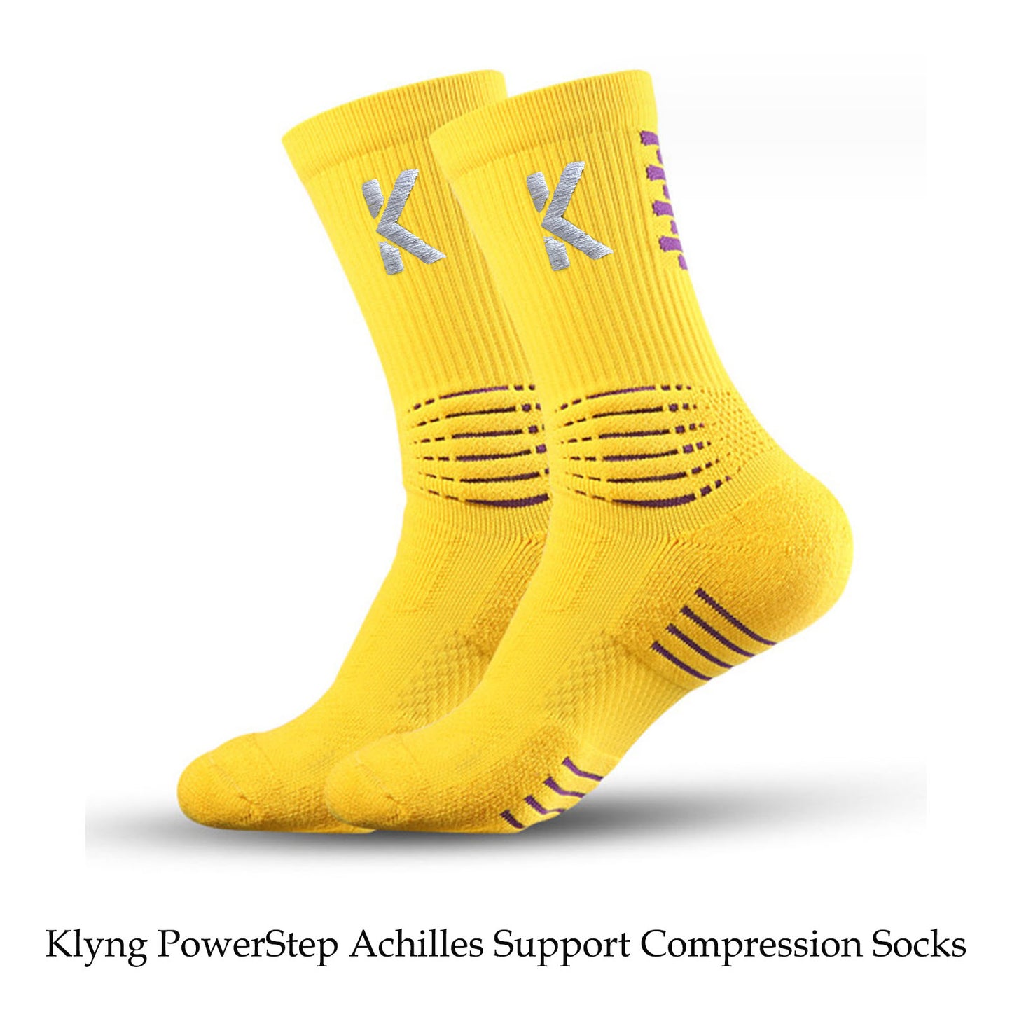 These unisex PowerStep Achilles Support Compression Socks by Klyng are designed in yellow with gray and purple accents on the heel and calf, ideal for intense games such as pickleball. They feature a logo on top and textured areas that enhance support for your Achilles.