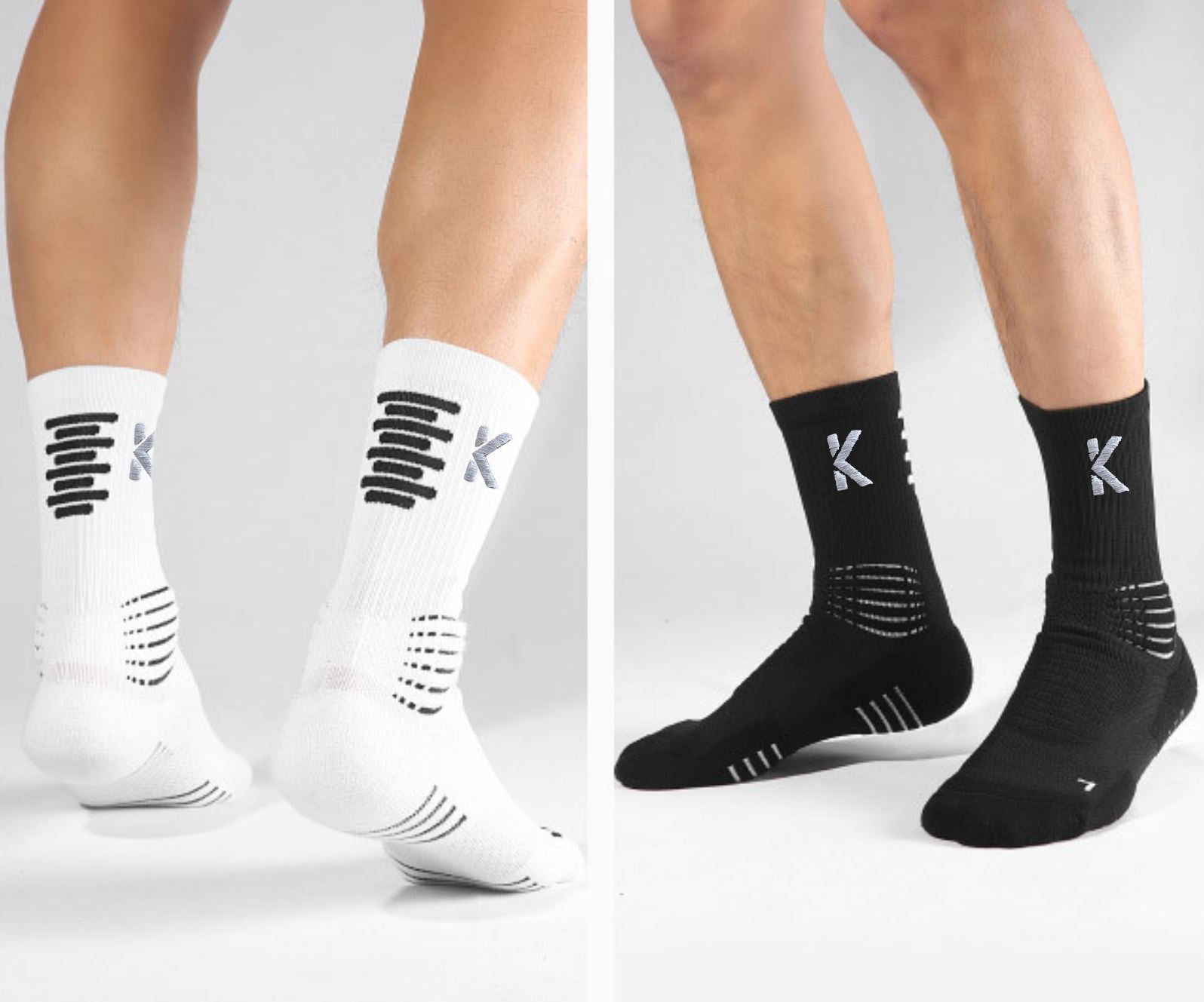 Two pairs of legs sporting the PowerStep Achilles Support Compression Socks from Klyng: one pair in white featuring black stripes and details, and the other in black with white stripes and embellishments. These compression socks showcase a stylized "K" logo near the top, ideal for pickleball enthusiasts. The backdrop is a light gray hue.