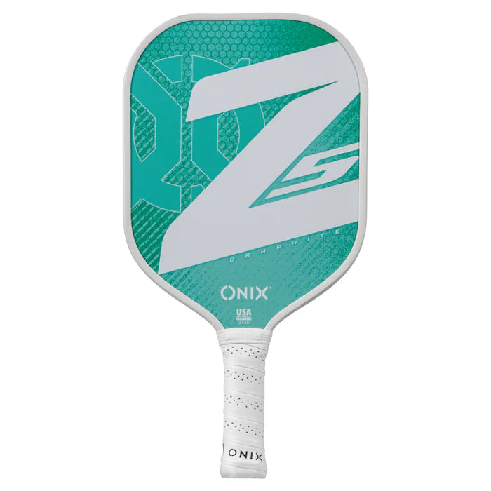 The Graphite Z5 v3 Pickleball Paddle by Onix showcases a unique green and white design, prominently featuring a large Z logo on the surface and "ONIX" at the bottom. Its handle, wrapped in white grip tape, is shaped like a traditional tennis handle for improved grip, capturing the spirit of the Graphite Z5 collection.