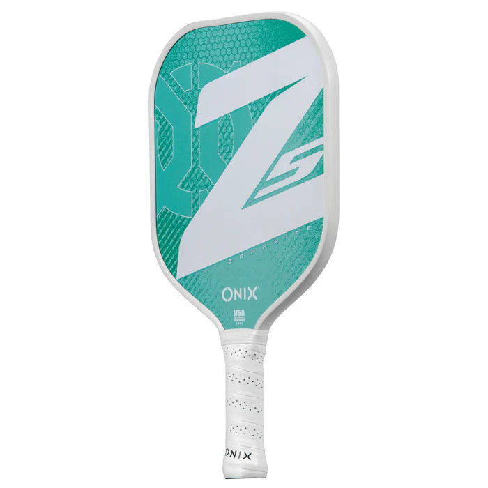 Introducing the Graphite Z5 v3 Pickleball Paddle by Onix, showcasing a teal and white face adorned with a prominent Z design and hexagonal patterns. It features a tennis-style handle wrapped in white grip tape, making it an ideal choice for players seeking precision and style on the court.