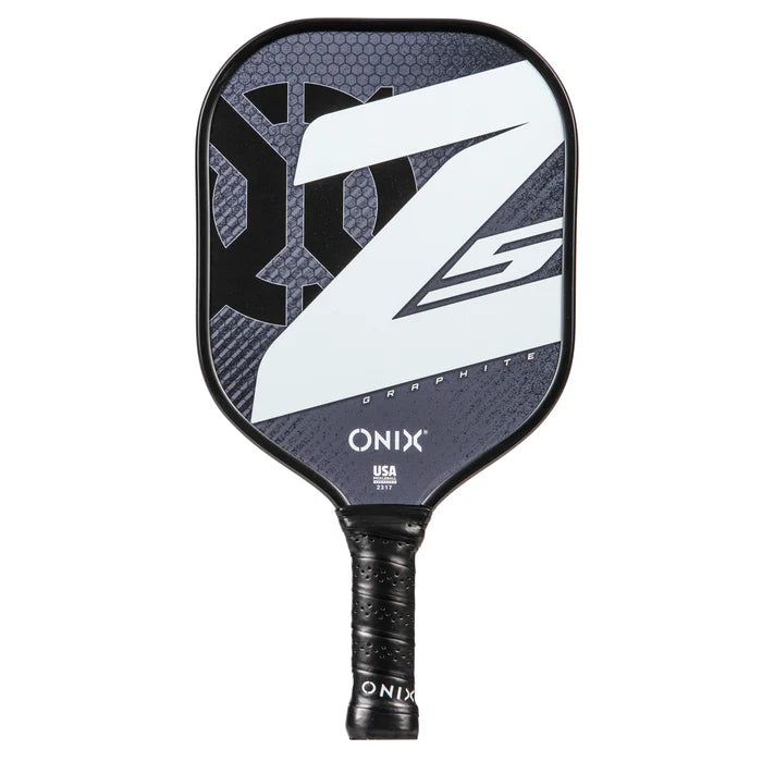 The Graphite Z5 v3 Pickleball Paddle showcases a sophisticated black handle and a striking "Z" on its surface. With the Onix brand prominently displayed, this USA-made paddle embodies quality and excellence in every game.