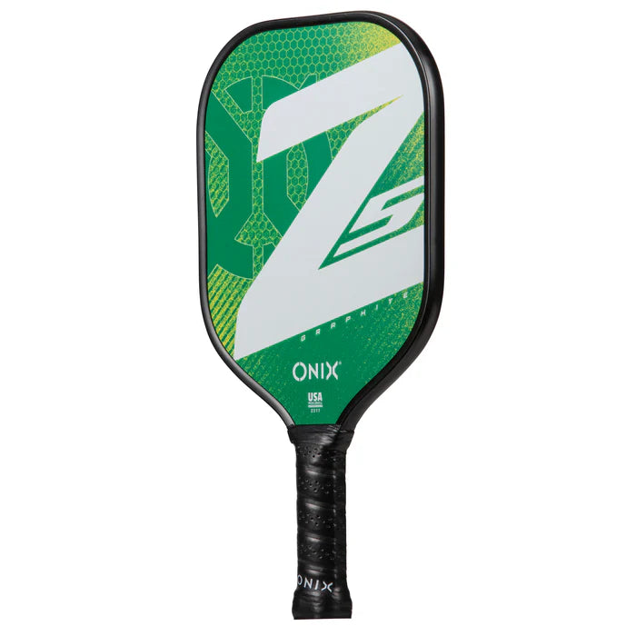 The Graphite Z5 v3 Pickleball Paddle from Onix displays a bold green and black design, highlighted by a large Z and the Onix brand logo near its textured tennis handle shape.