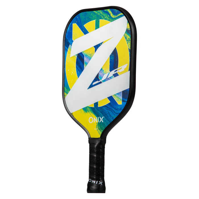 The Onix Composite Z Junior v2 Pickleball Paddle is perfect for junior players, featuring a lightweight composite design and a vibrant color scheme with a prominent white Z design on a blue and yellow background. The handle is wrapped in black grip tape for enhanced grip.