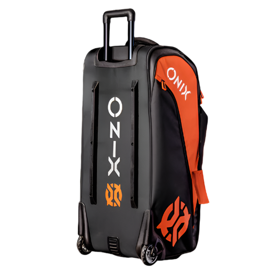 The Pro Team Wheeled Duffle Pickleball Bag in black and orange prominently showcases the Onix brand name. It features zippered pockets, dual wheels, and an extendable handle for easy transport.