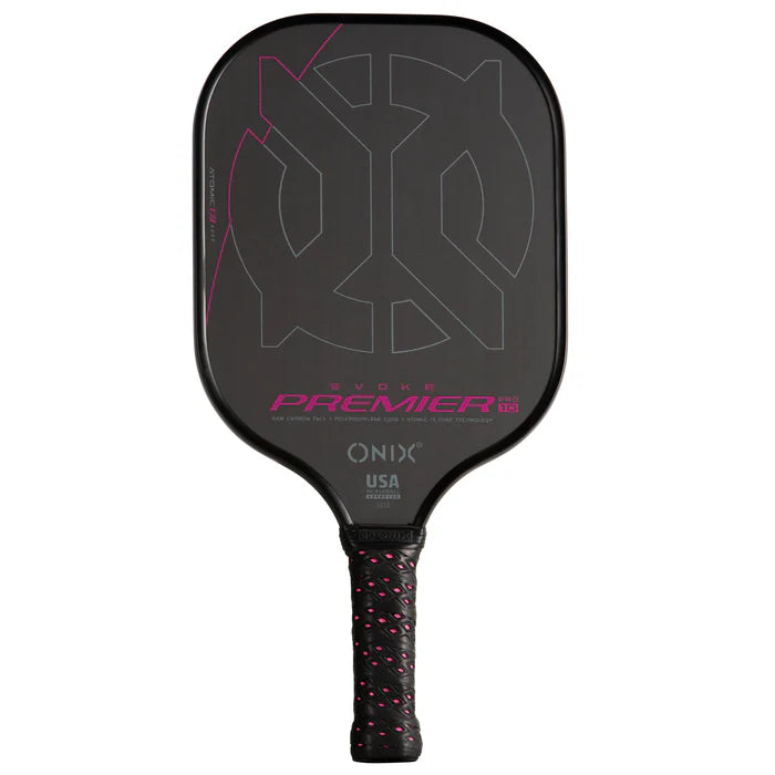 The Evoke Premier Pro Raw Carbon Pickleball Paddle by Onix showcases a lightweight black design with a pink and grey geometric pattern on its surface. It features the text "Evoke Premier" and "Onix USA". The carbon fiber surface is complemented by a handle with a textured grip accented in pink for enhanced control.