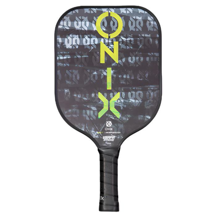 The Graphite React Pickleball Paddle by Onix features a glossy black finish with a repetitive design. It proudly displays bold ONIX text in vibrant green and incorporates the advanced Fusion Core technology to boost performance. The handle is wrapped in black grip material for added comfort.