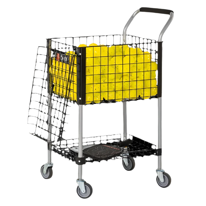 The Onix Pickleball Teaching Cart, featuring a striking black and silver design with grid-style mesh sides, is filled with bright yellow tennis balls. Its heavy-duty construction includes four swivel caster wheels for effortless mobility, making it a versatile cart for both pickleball and tennis.